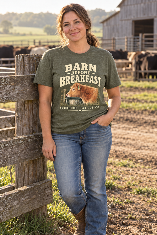Woman wearing the Barn Before Breakfast tee in Heathered Olive at the barn